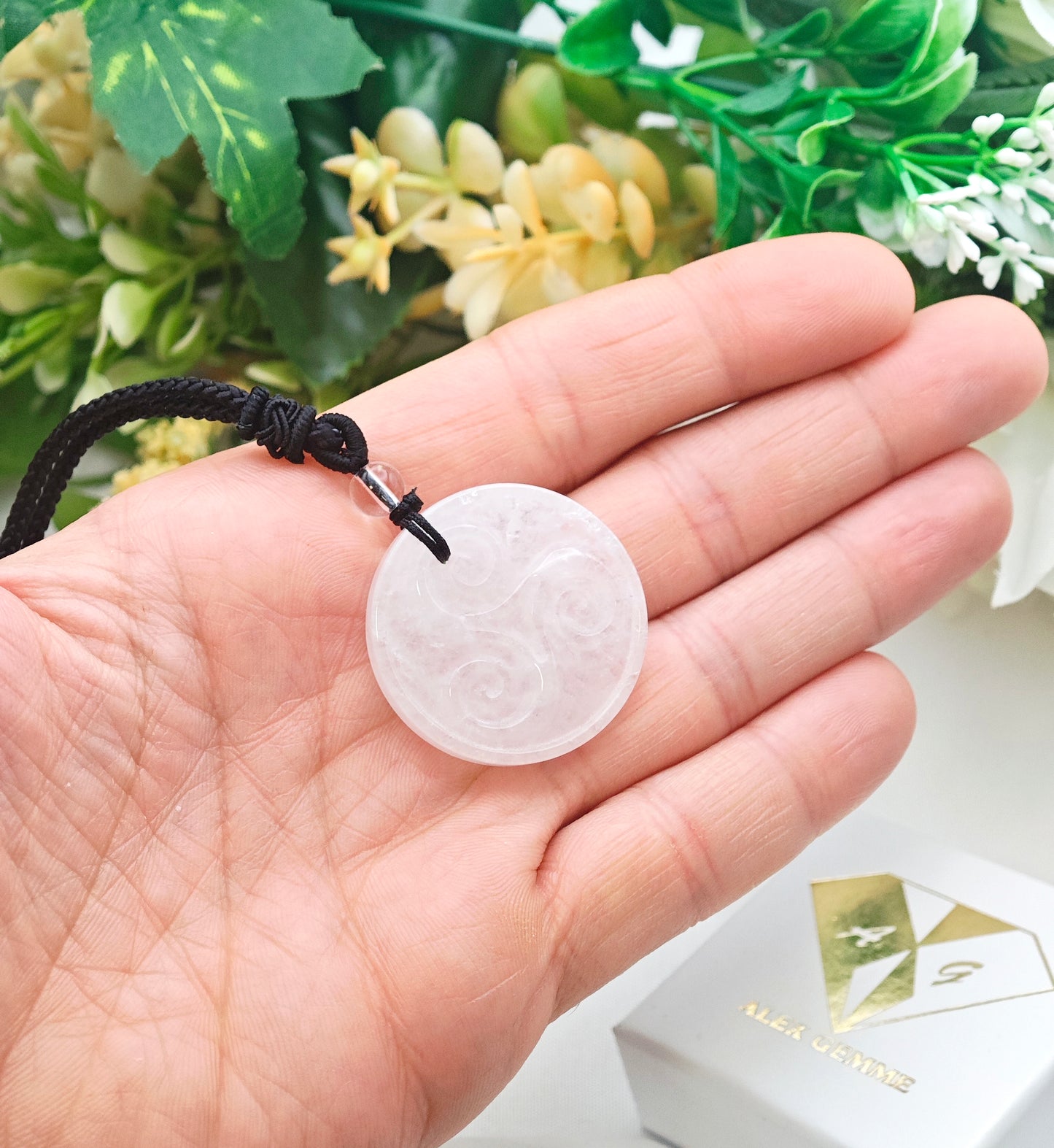 CIONDOLO TRISKELE IN CRISTALLO DI ROCCA