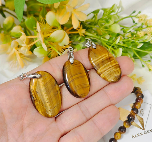 CIONDOLO IN OCCHIO DI TIGRE CON BRACCIALE IN OMAGGIO